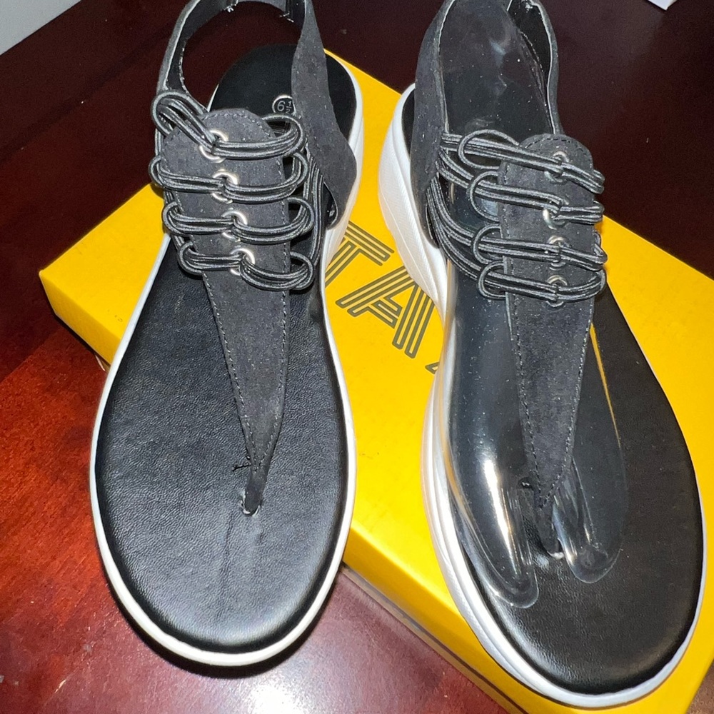 Stretchy black slip-on sandal, size 6.5